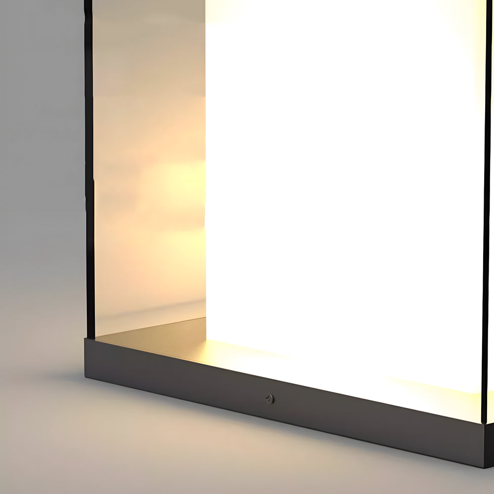 Sleek gate pillar light installed on a stone pillar, offering stylish illumination for driveways.
