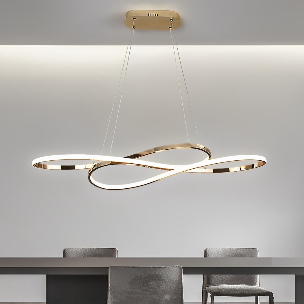 LED infinity chandelier with sleek design hanging above dining table.