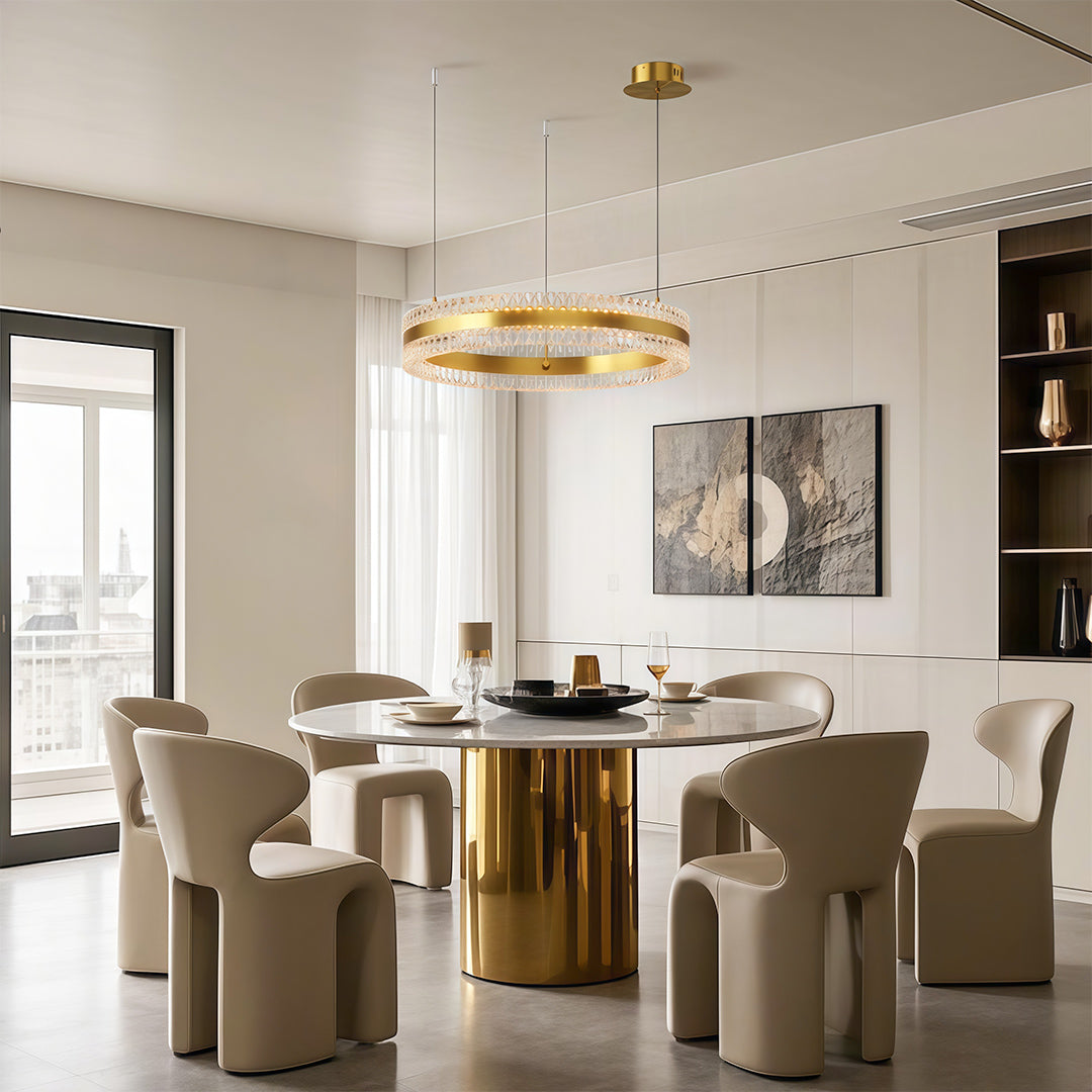 Sleek modern circular chandelier with dual rings, enhancing a modern dining area with natural light.