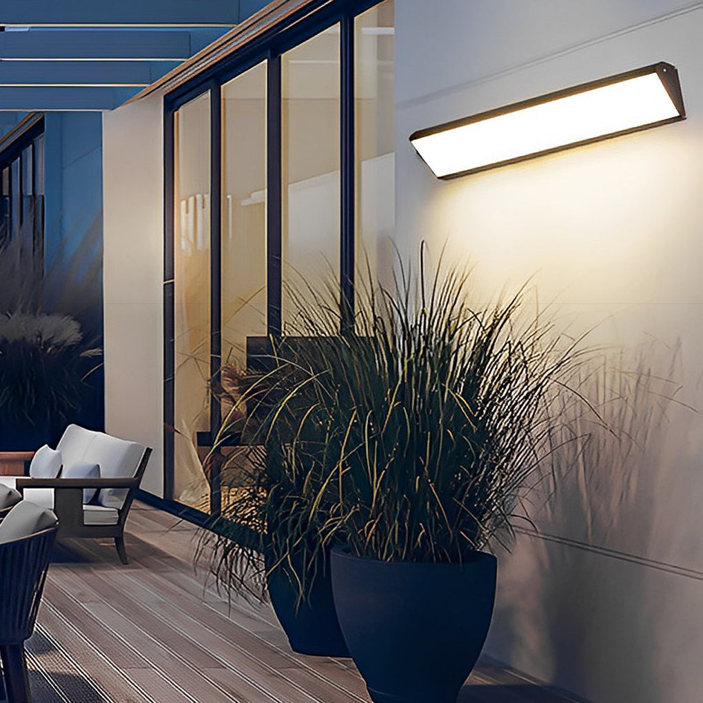 Side profile of slim rectangular outdoor wall sconce with minimalist design.