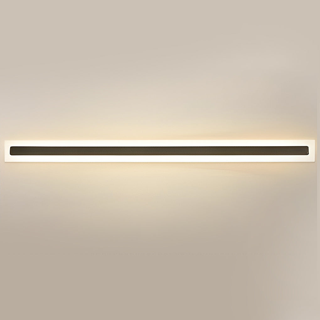 Acrylic wall sconce held in hand, showcasing slim vertical design for contemporary indoor or outdoor lighting