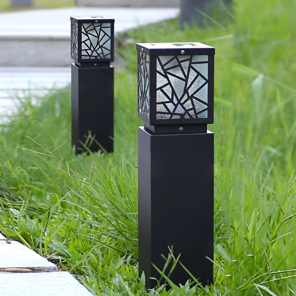 Solar bollard path lights illuminating a cozy outdoor deck with directional glow.