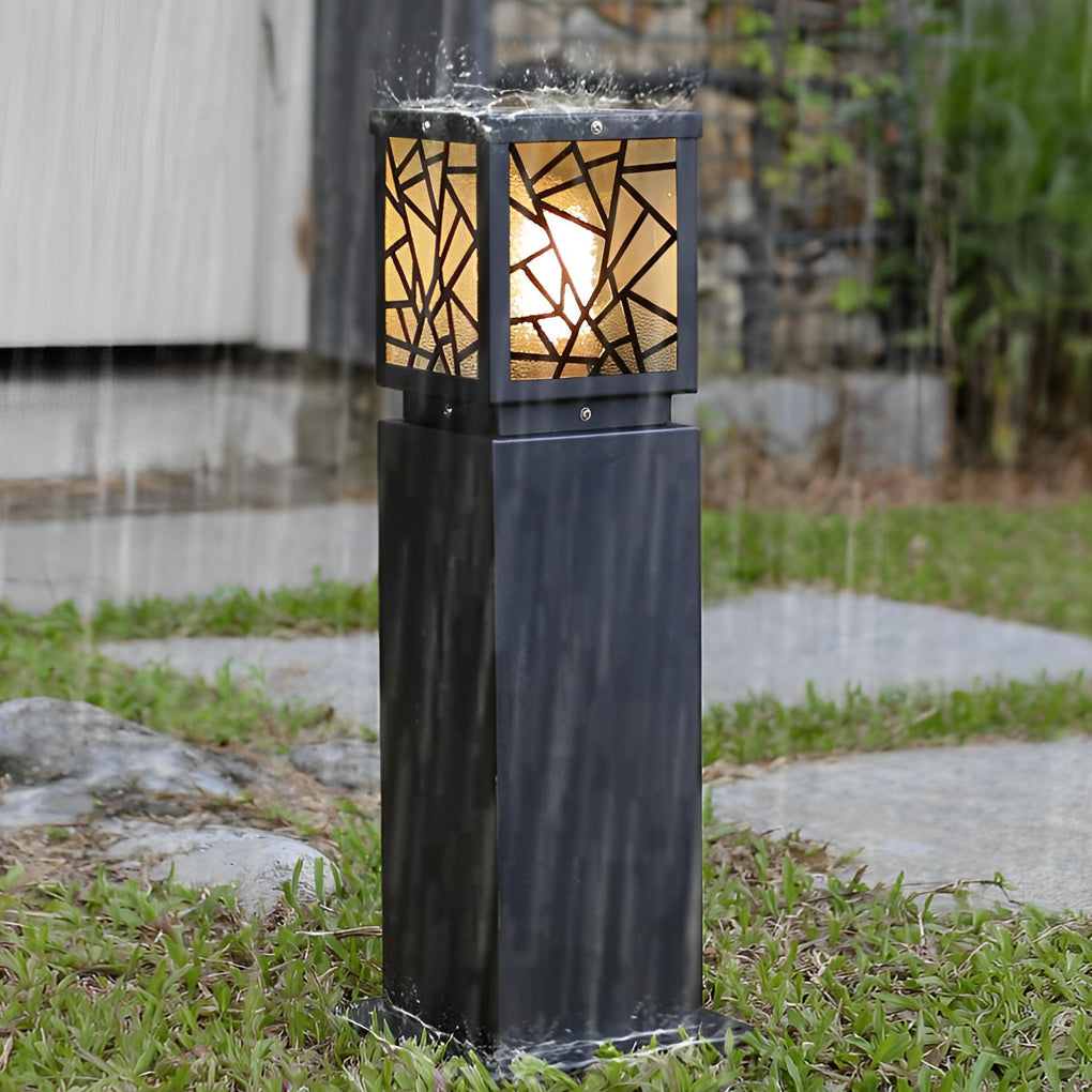 Solar bollard path lights enhancing a stylish outdoor grass path with ambient light.