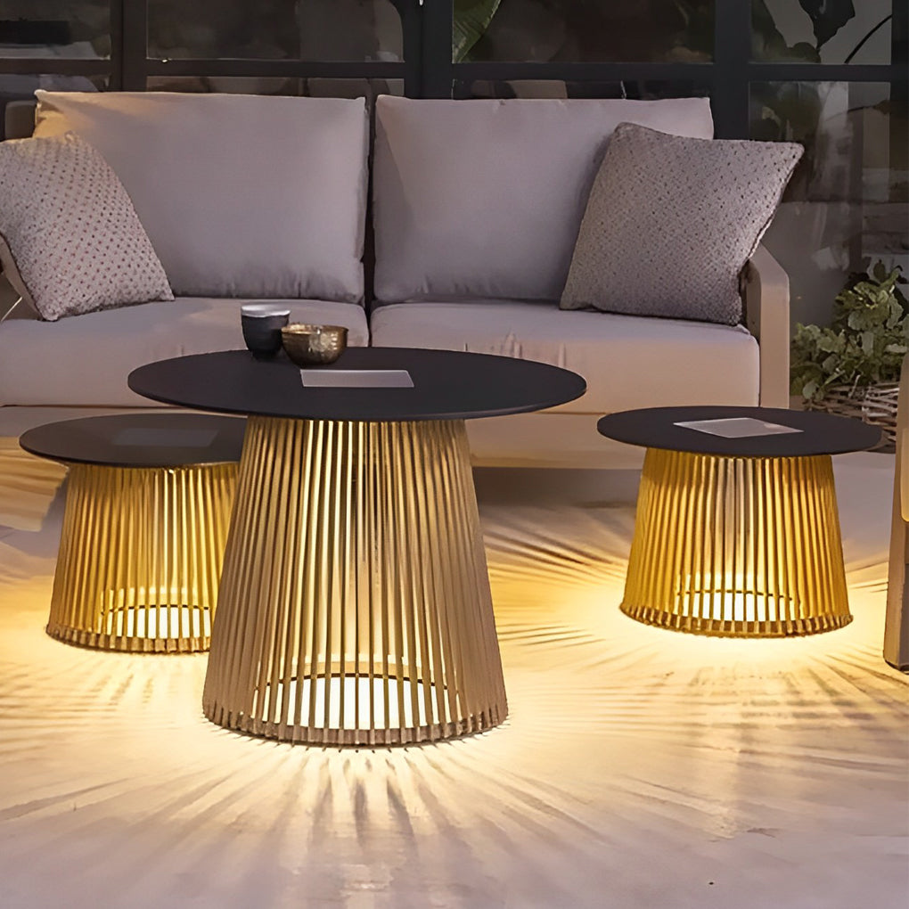 Solar coffee table with a black tabletop, providing ambient light in a living room.