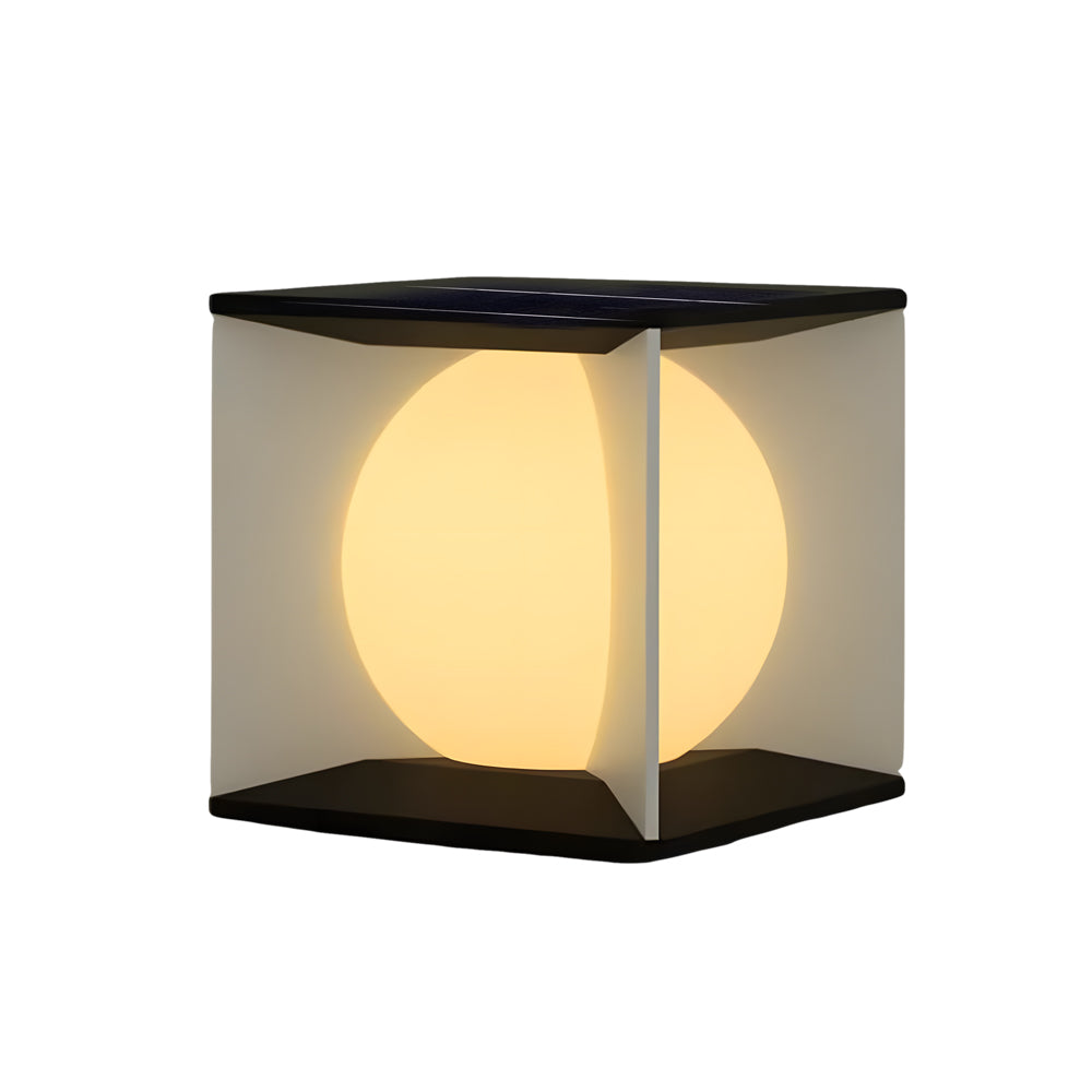 Solar-powered cube outdoor light with warm LED illumination and sleek black base design