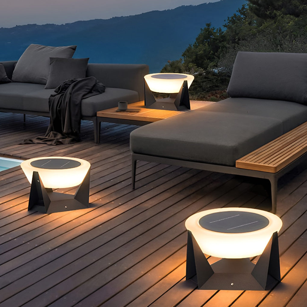 Solar fence pillar light placed near pool deck seating, providing layered outdoor lighting effects.
