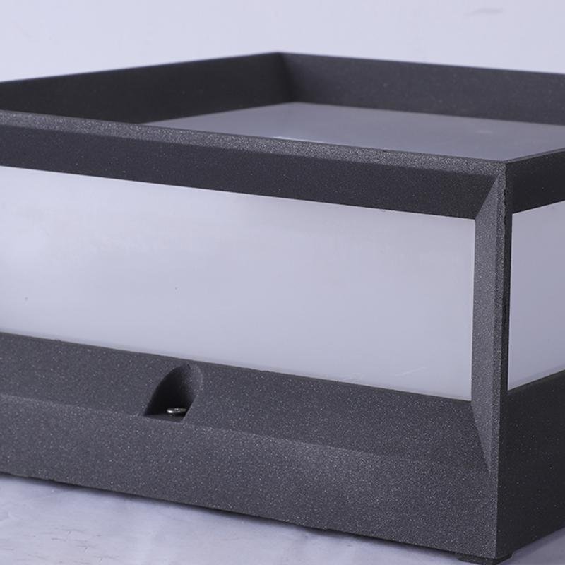 Solar garden pillar lights with black frame, showcasing solar panel on top for energy efficiency.