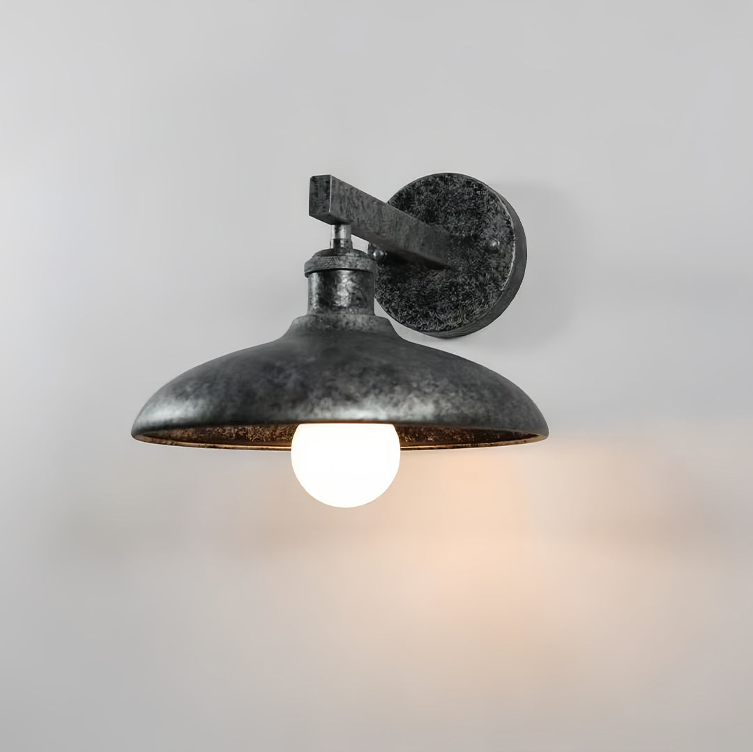 Rustic black solar lights outdoor wall fixture with weathered texture and warm illumination.