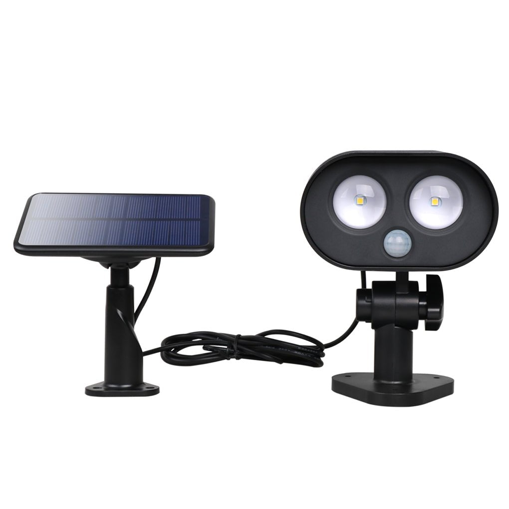 Isolated product image showing front view of a compact solar motion sensor lamp.
