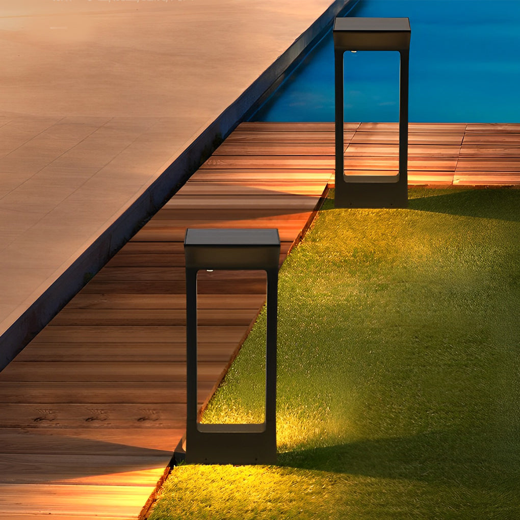 Minimalist solar pathway outdoor lamp lighting grass lawn edge near poolside.