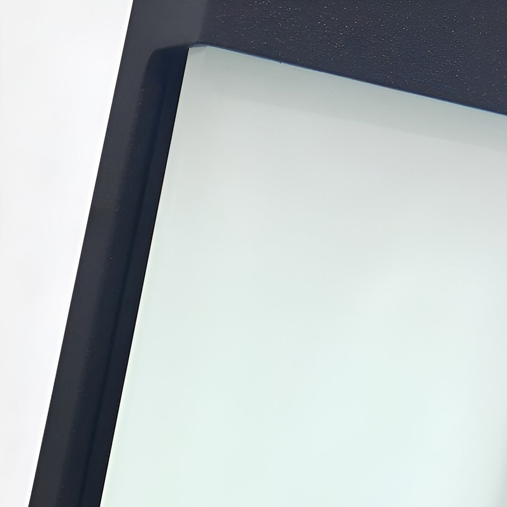 Solar powered outdoor sconces with black frame and angled design on exterior wall.