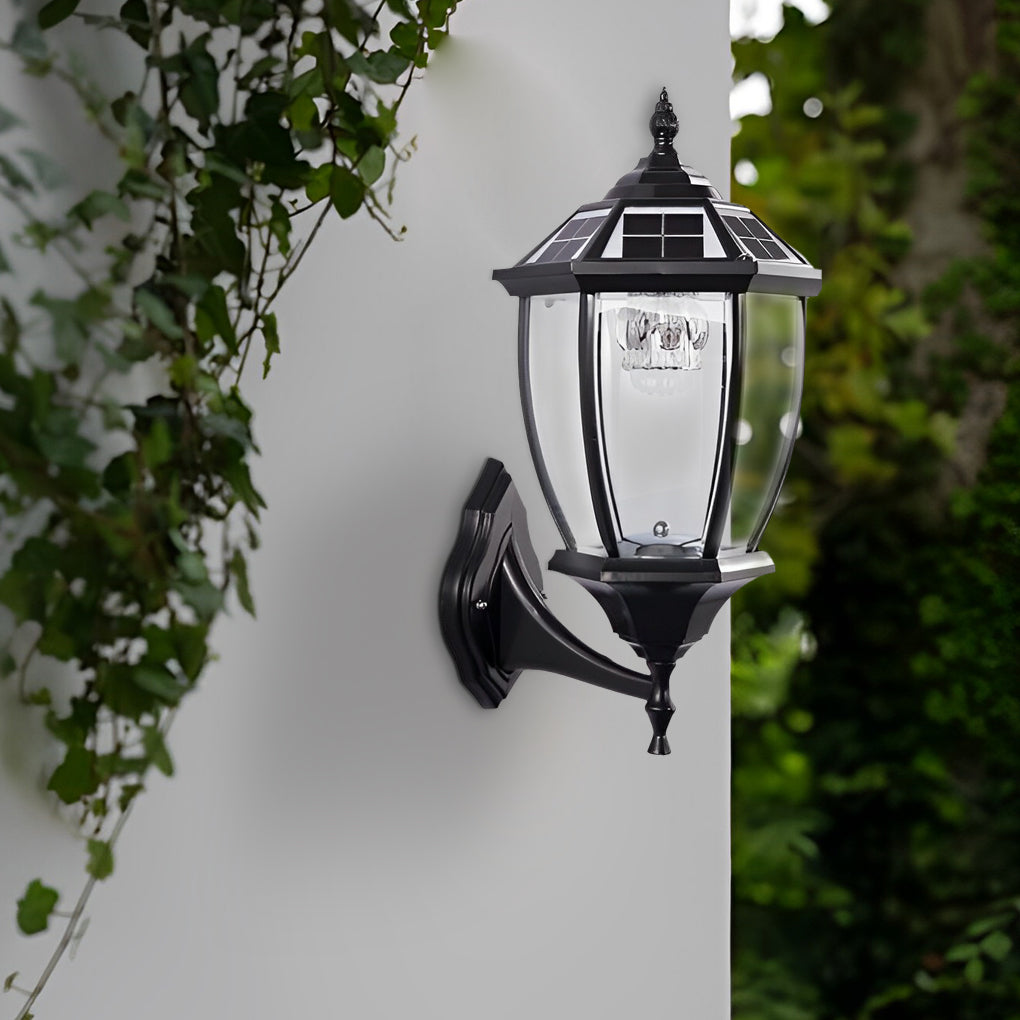 Solar powered pillar lights illuminating a contemporary garden with ambient light.
