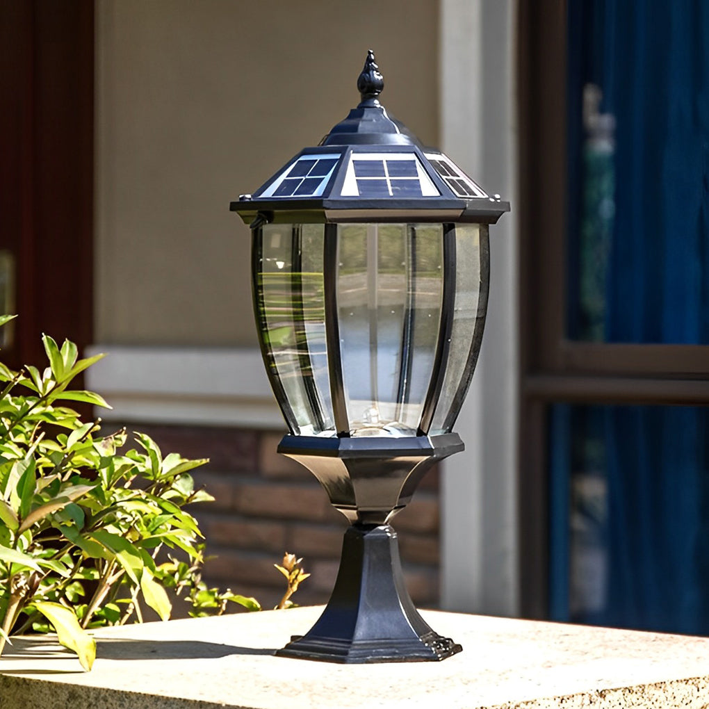 Solar powered pillar lights enhancing a garden with sleek, sustainable design.
