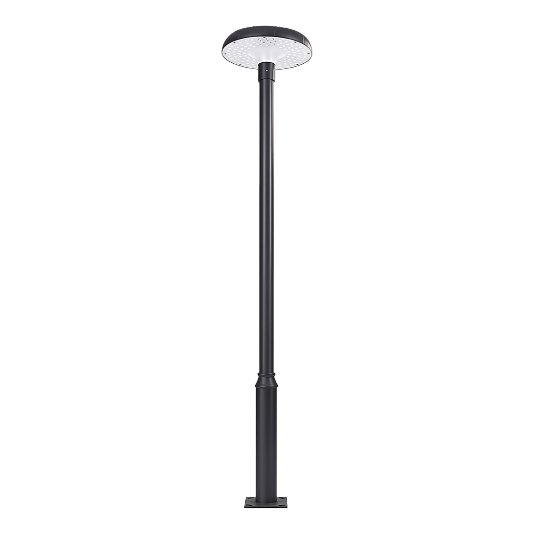 Solar-powered streetlight casting light over a peaceful park bench at night.