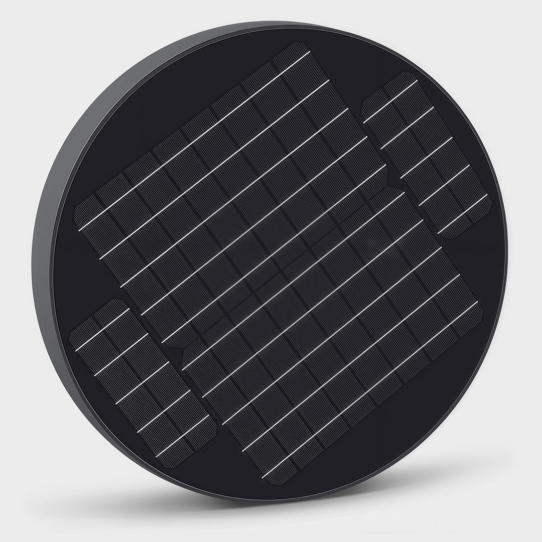 Solar streetlight casting light over a garden path, showcasing clean energy use.