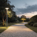 Solar UFO street light illuminating a garden pathway with a modern and sleek design.