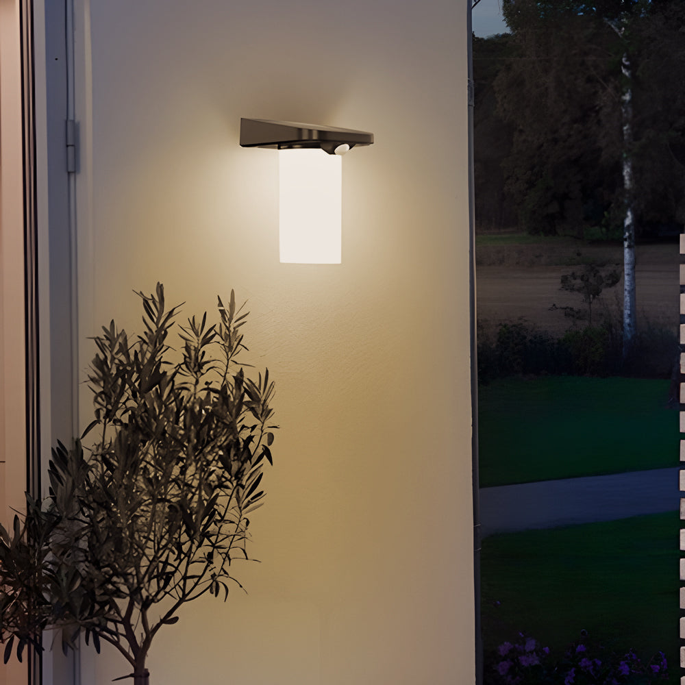 Close-up of solar wall lamp with motion sensor showcasing its sleek design.