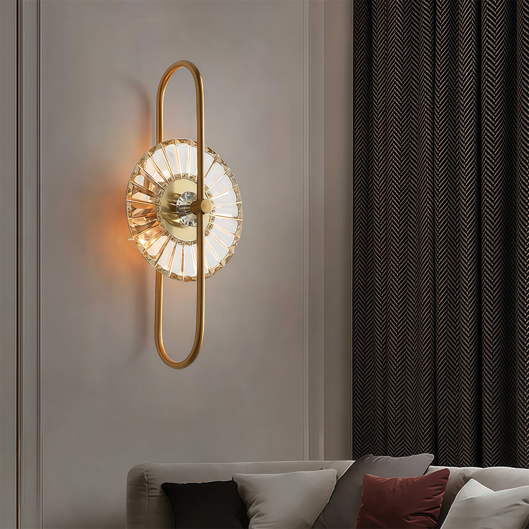 Sophisticated crystal wall sconces lighting with glass shade chandelier influence providing decorative accent on contemporary gray wall.