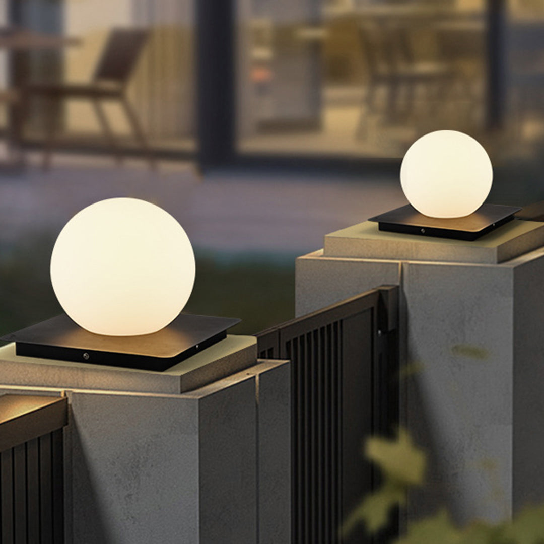 Silver Metal Table Lamp modern outdoor pillar lights featuring sphere and cube designs on contemporary architectural surfaces