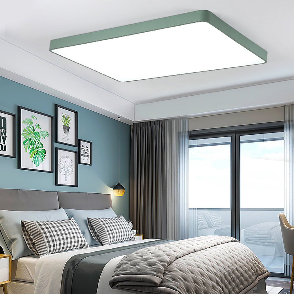 Square ceiling light installed in a stylish bedroom with accent wall decor.