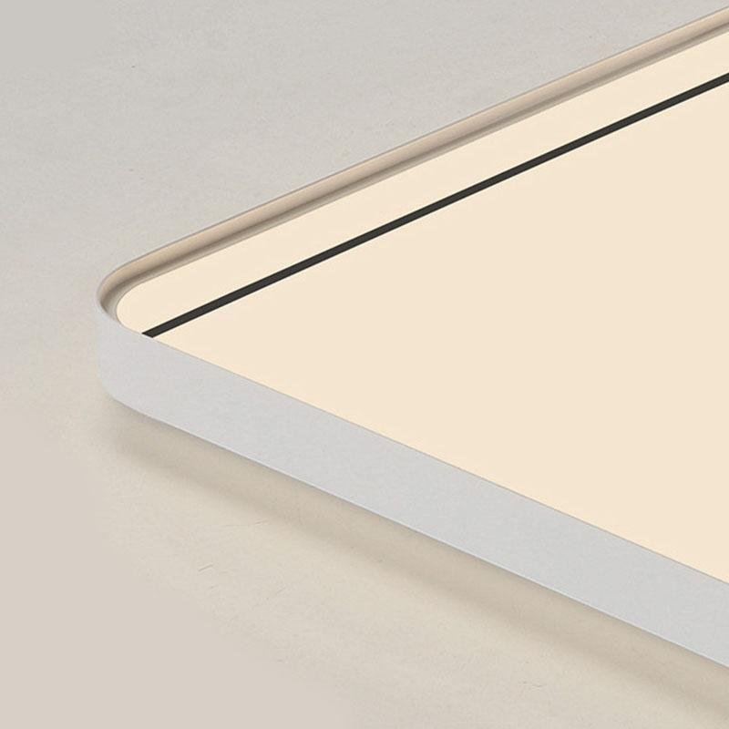Square flush mount ceiling light close-up showing slim frame edge detail.