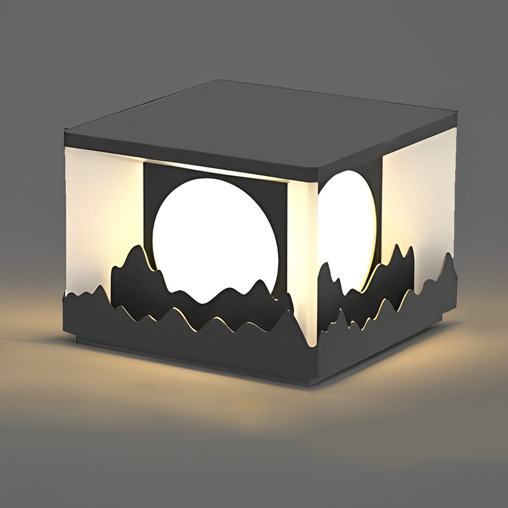 Square outdoor pillar lights enhancing a contemporary outdoor space with geometric design.