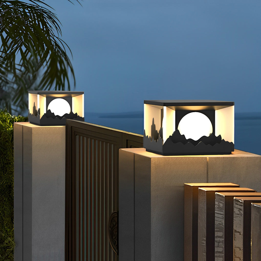 Square outdoor pillar lights illuminating a modern outdoor deck with minimalist design.