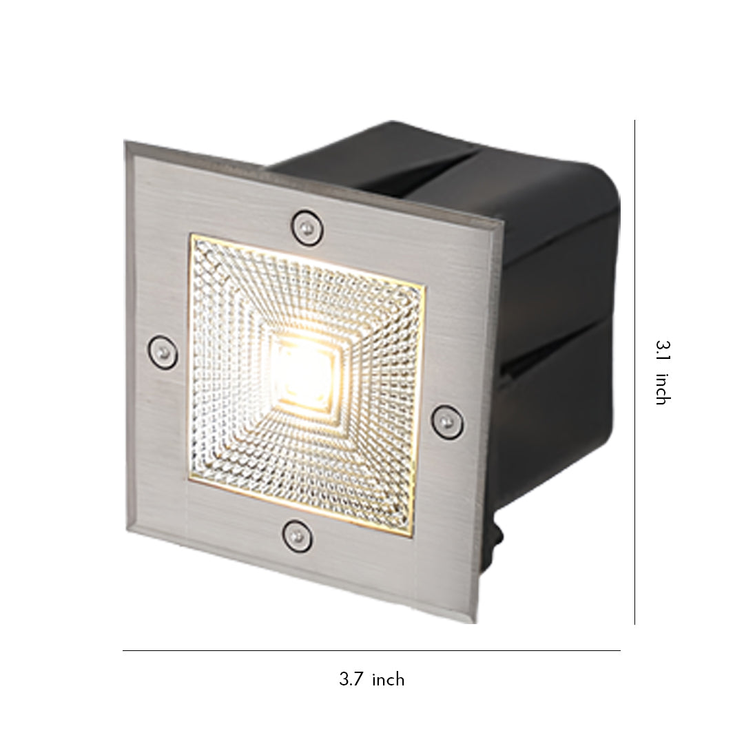 Square recessed outdoor inground lighting fixture with stainless steel trim and warm LED illumination.