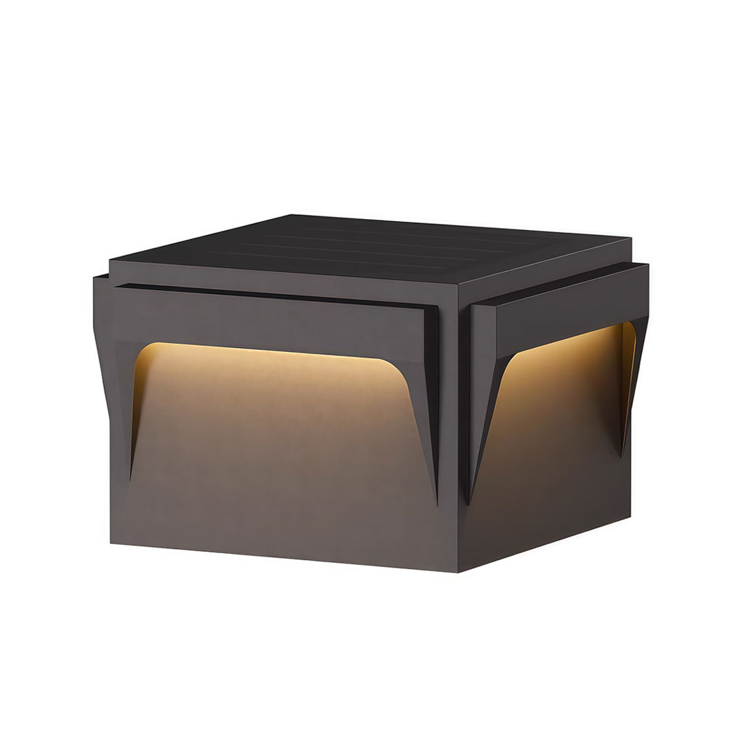 Stainless steel outdoor pillar light with a clean, angular design and soft lighting effect.