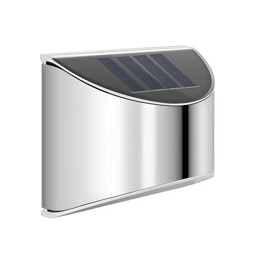 Stainless steel wall lamp with a curved top, highlighting its sleek and modern structure.