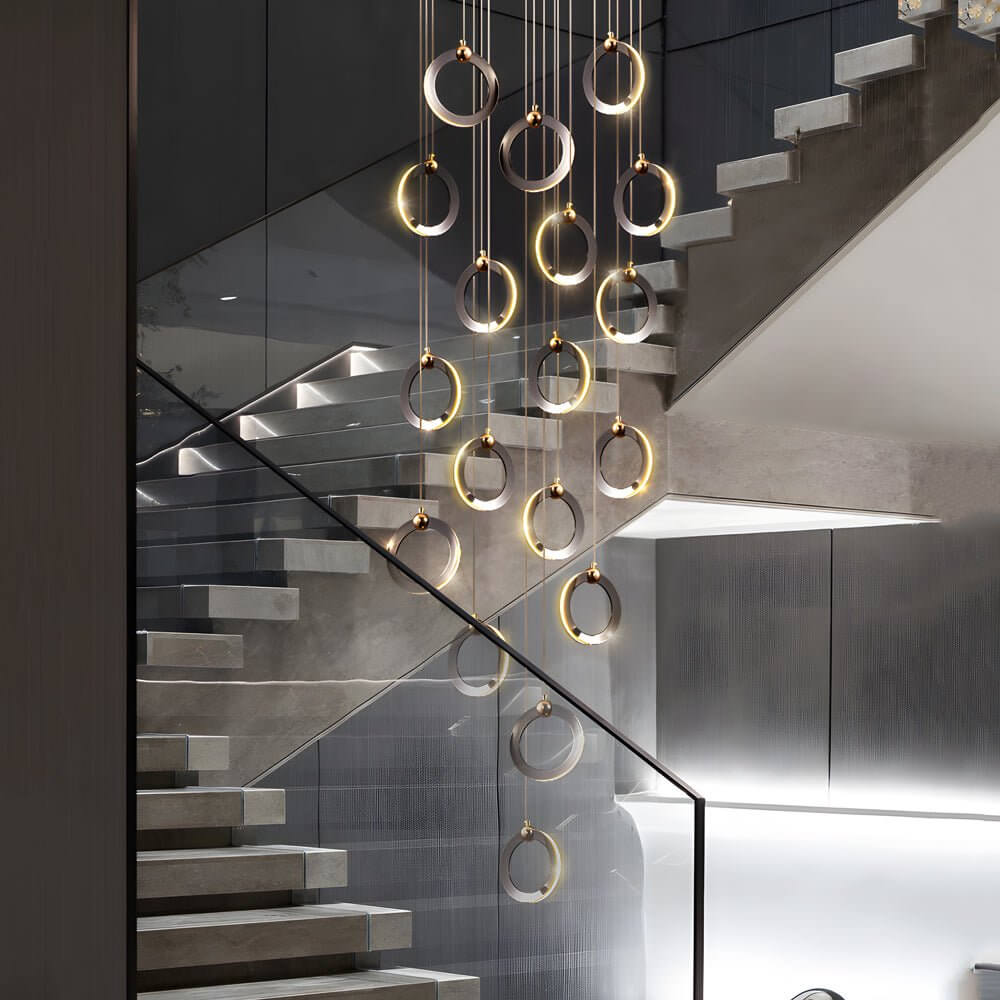 Staircase lighting chandelier with a close-up of its ring and light arrangement.