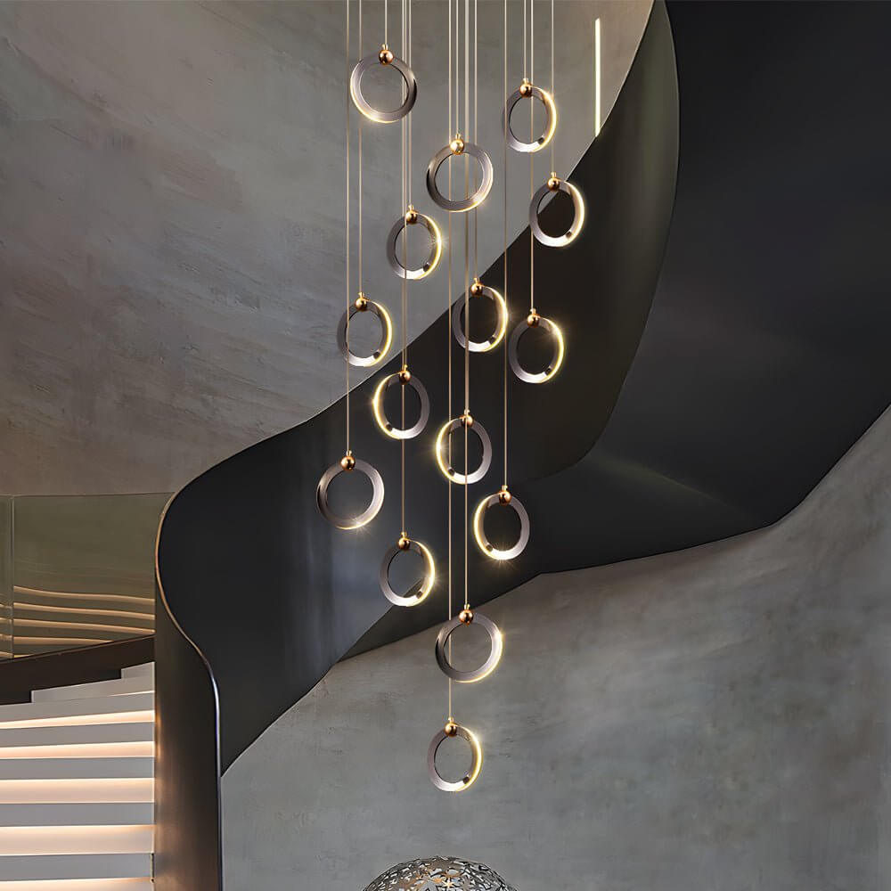 Staircase lighting chandelier with a minimalist design, illuminating a contemporary staircase.