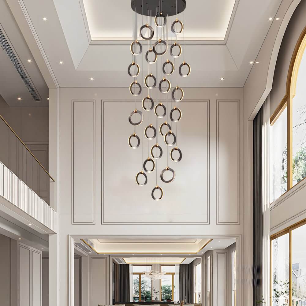 Staircase lighting chandelier with a modern design, enhancing a stylish interior.