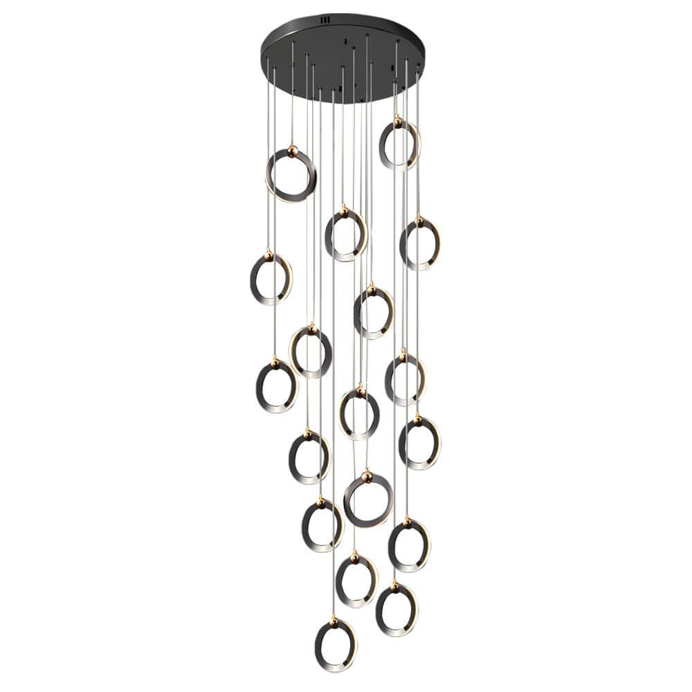 Staircase lighting chandelier with a sleek design, providing ambient light in a foyer.