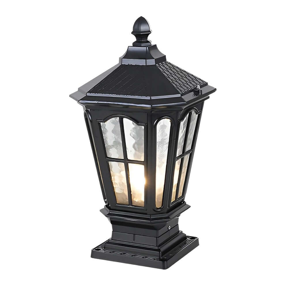 Classic black stone pillar light fixture with pyramid top displayed in studio lighting on white background.