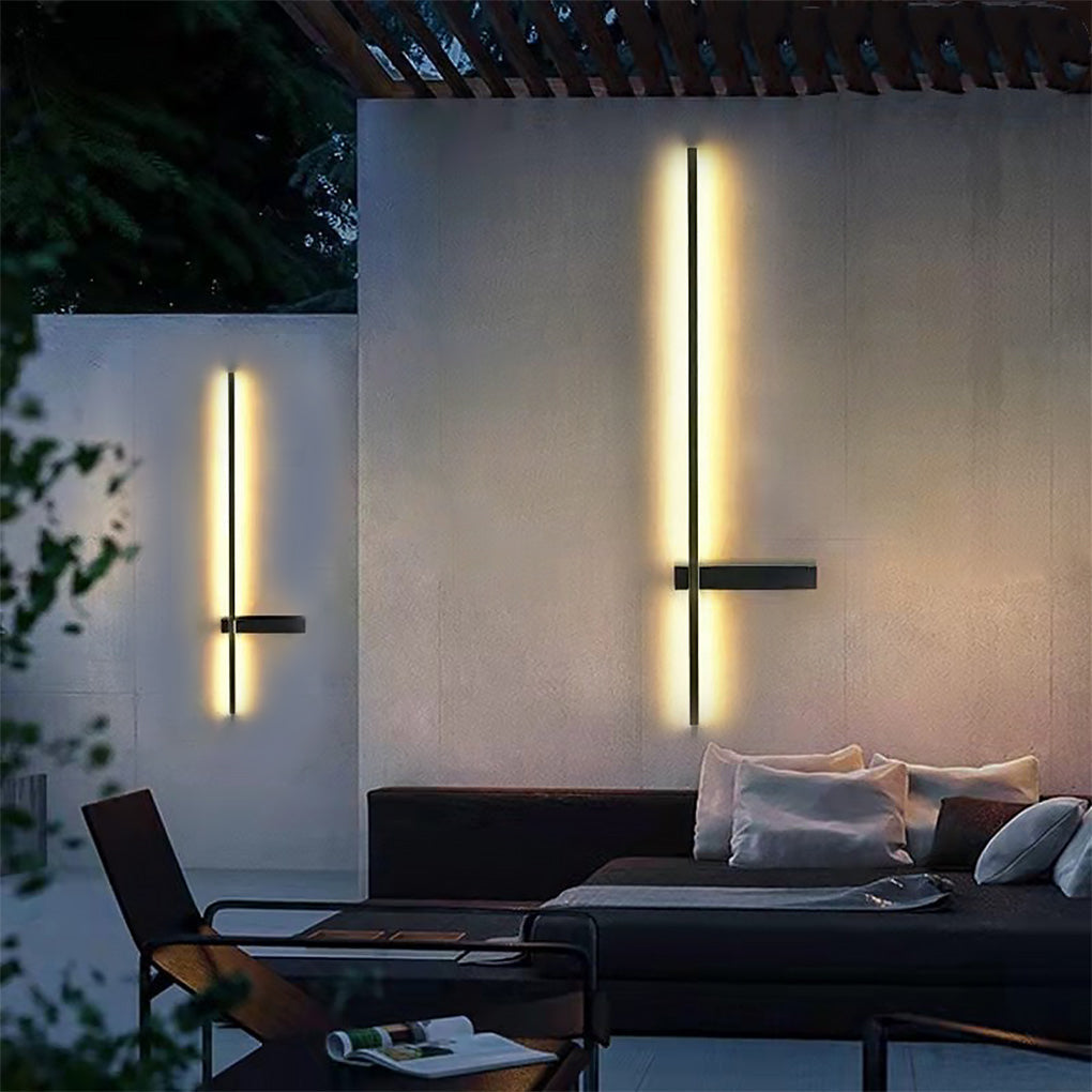 Modern Strip Wall Lighting installed on an exterior patio wall, featuring a vertical linear glow that creates a warm and minimalist outdoor ambiance.