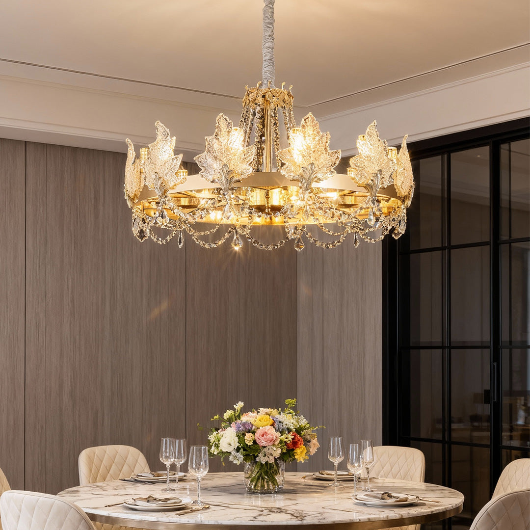 Gold French chandelier in a soft-toned dining room with elegant decor.