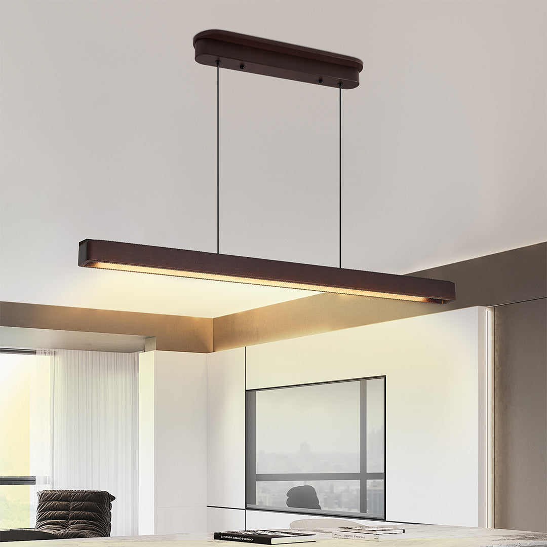 Dining room illuminated by modern linear LED pendant lighting, adding elegant and focused illumination.