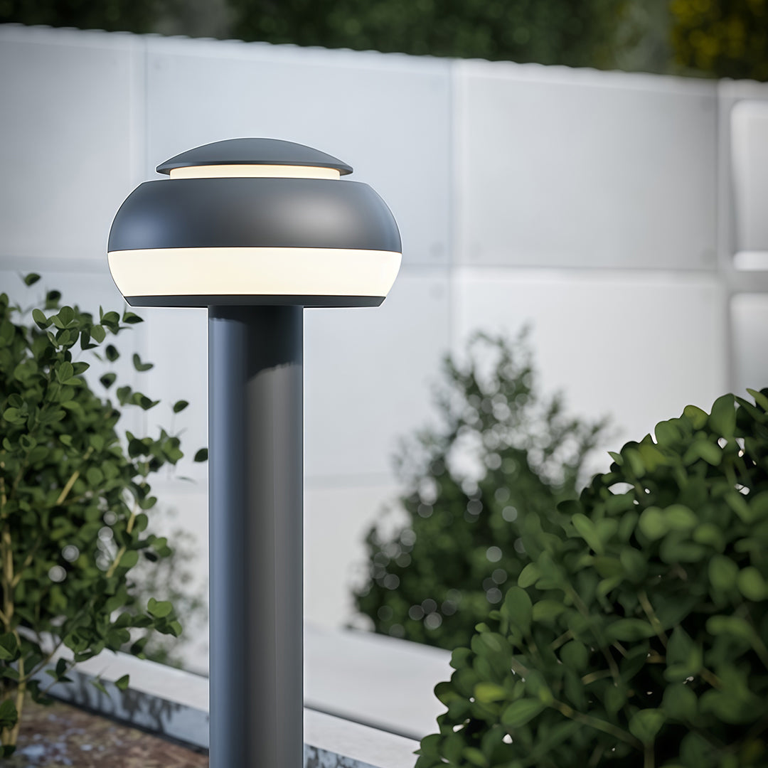 Enhance your pathways with a mushroom path light designed with a simple dome head and weatherproof build for lasting performance.