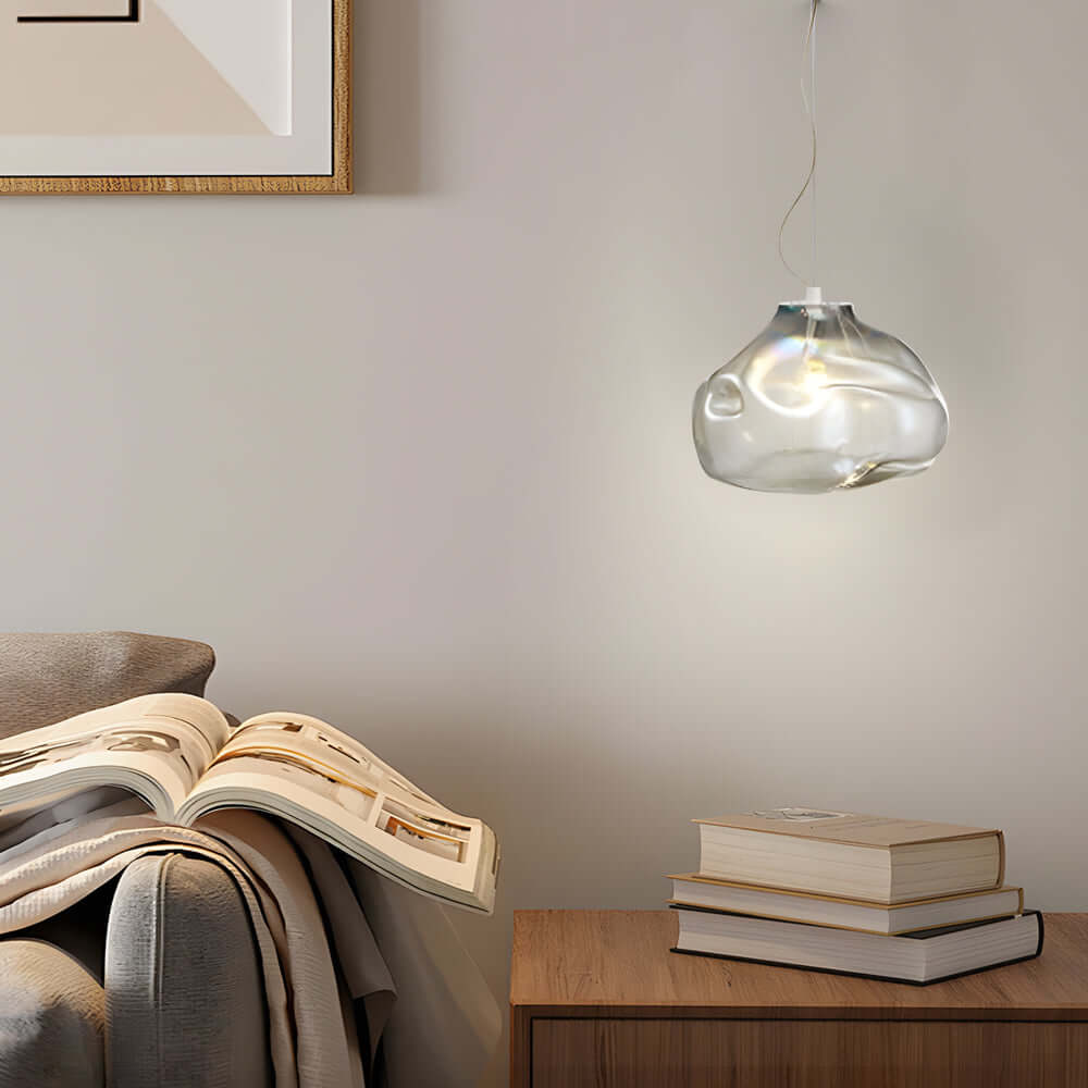 Enhance your interior with this Nordic hand-blown pendant light, crafted from textured transparent glass for soft, ambient lighting in kitchens, dining rooms, or bedrooms.