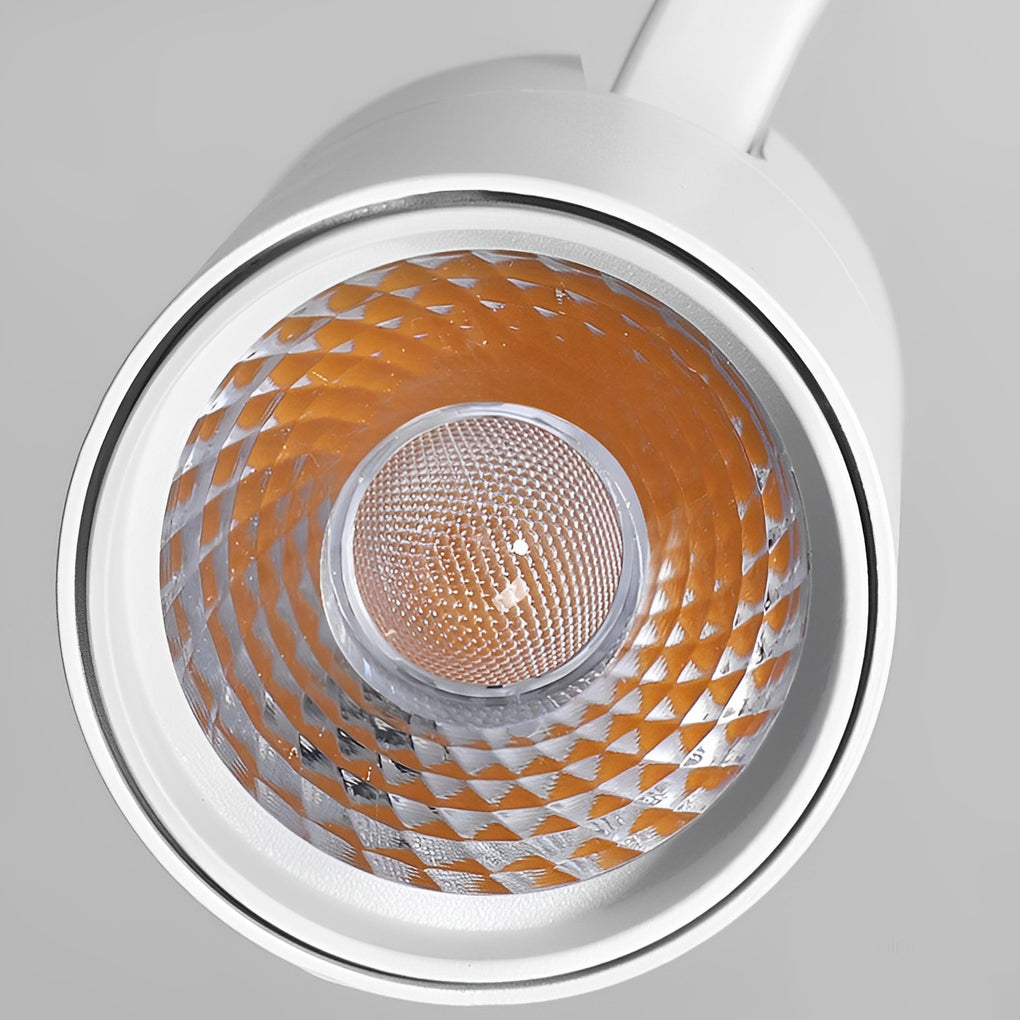 Close-up view of surface mounted spot light reflector and LED lens structure.