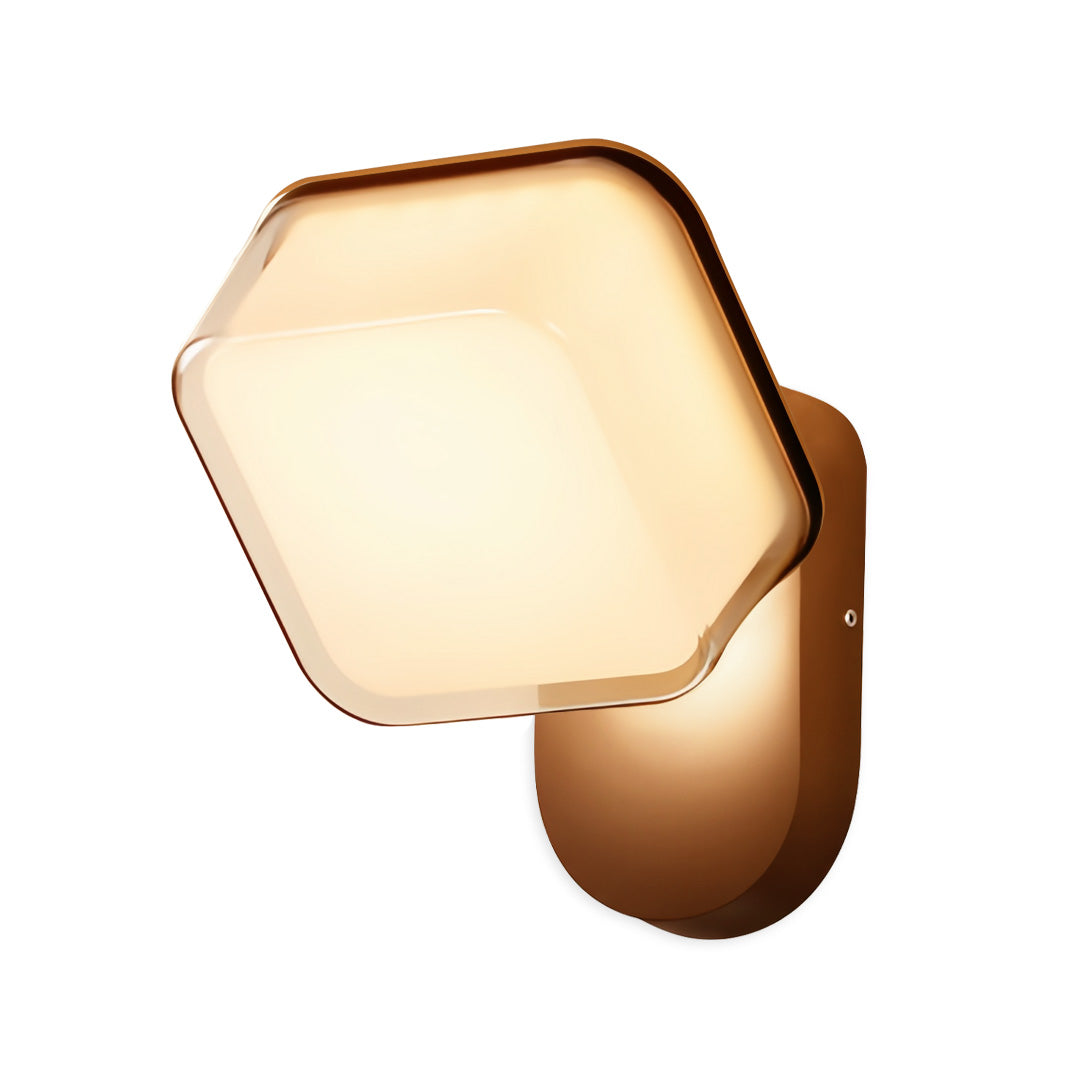 Soft-white hexagon swing wall light with smooth bronze mount, suitable for contemporary wall illumination.