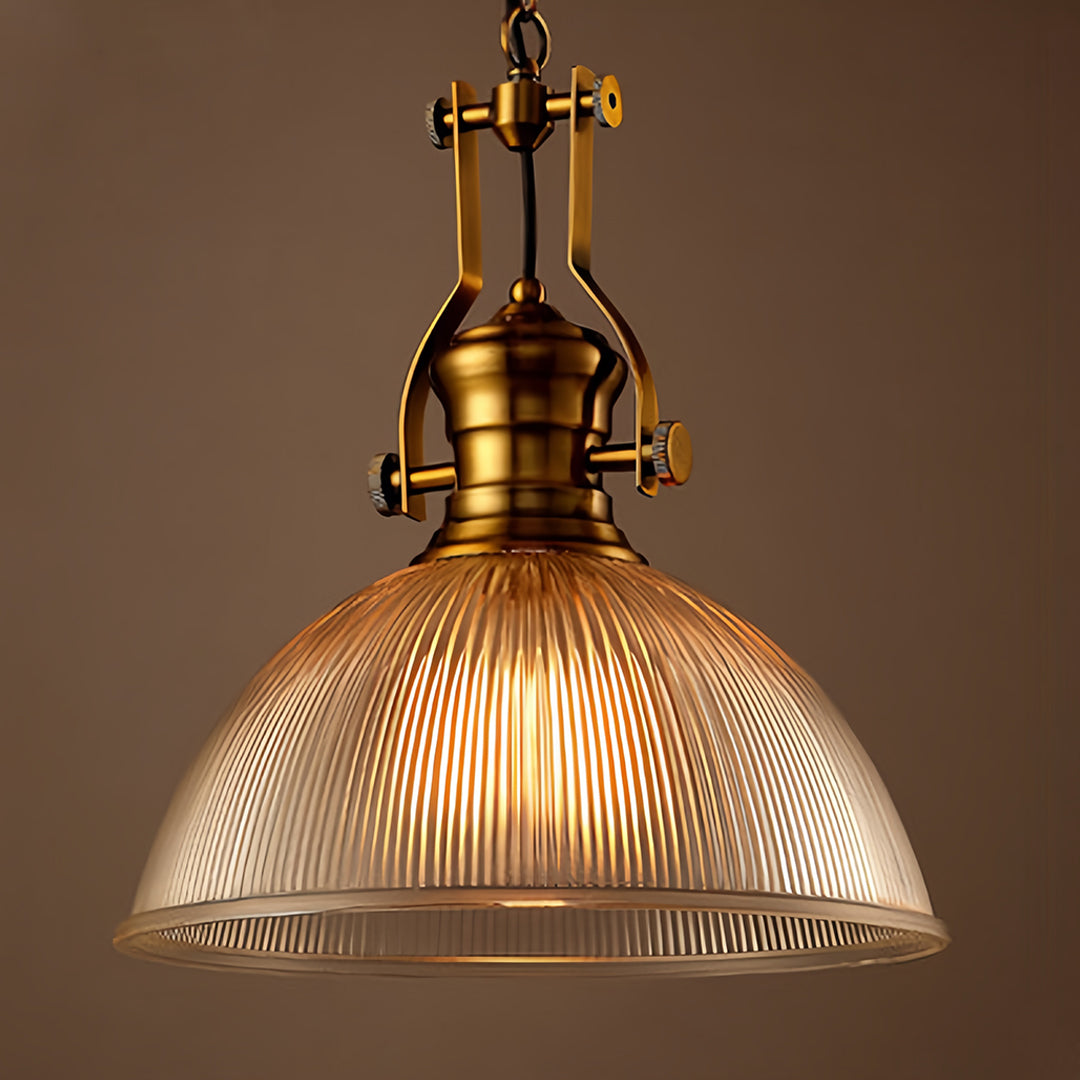 Textured glass pendant light in contemporary dining space with dark walls and sophisticated restaurant-style ambiance