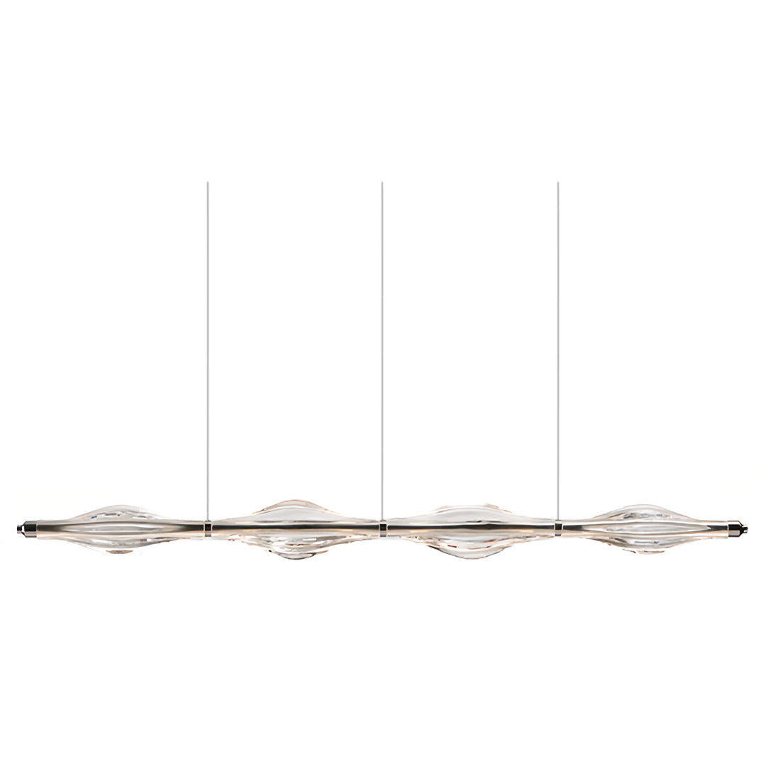 Three crystal pendant lights for kitchen island aligned in a row, providing modern and stylish illumination.
