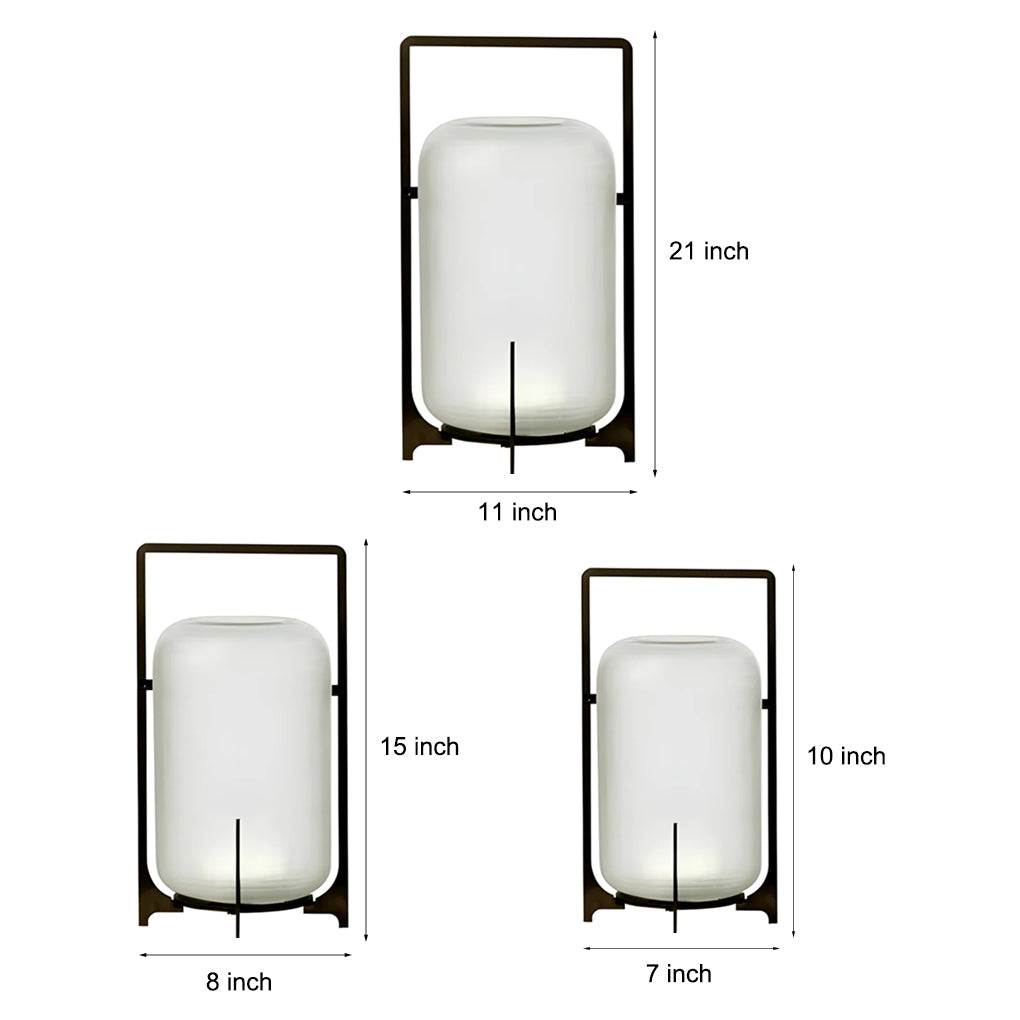 Top view of outdoor modern handle lantern frosted glass shade with warm light glow.