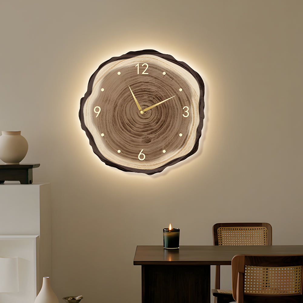 Stylish tree stump wall clock with organic wood texture and modern golden accents, perfect for contemporary home decor.