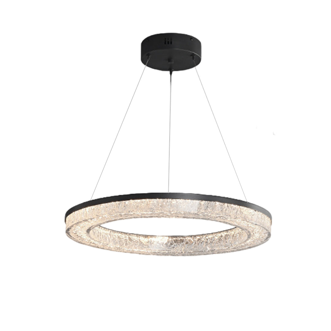 Two circle pendant lights with metallic frames, providing stylish illumination in a modern living room.