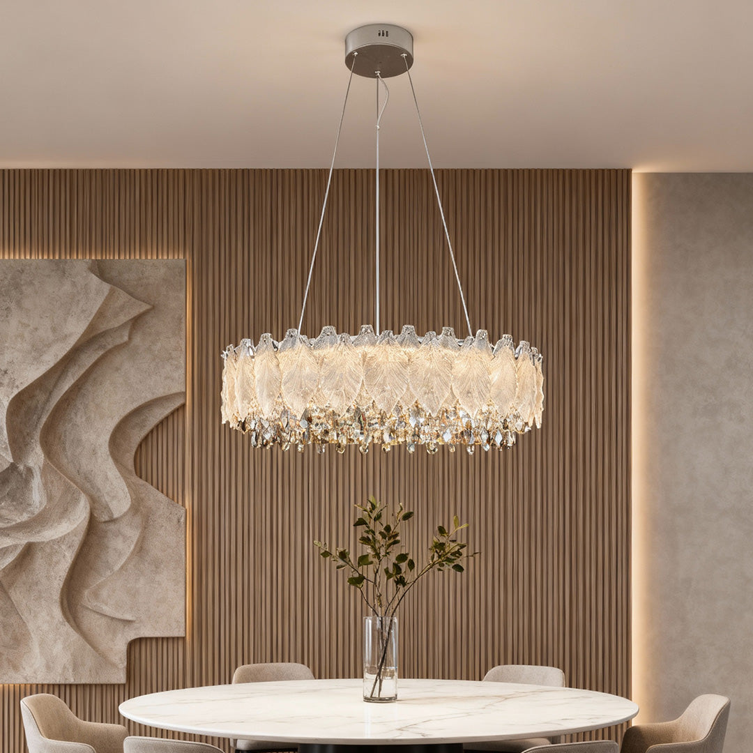 Two-tier country French chandelier with gold finish hanging in elegant dining room.