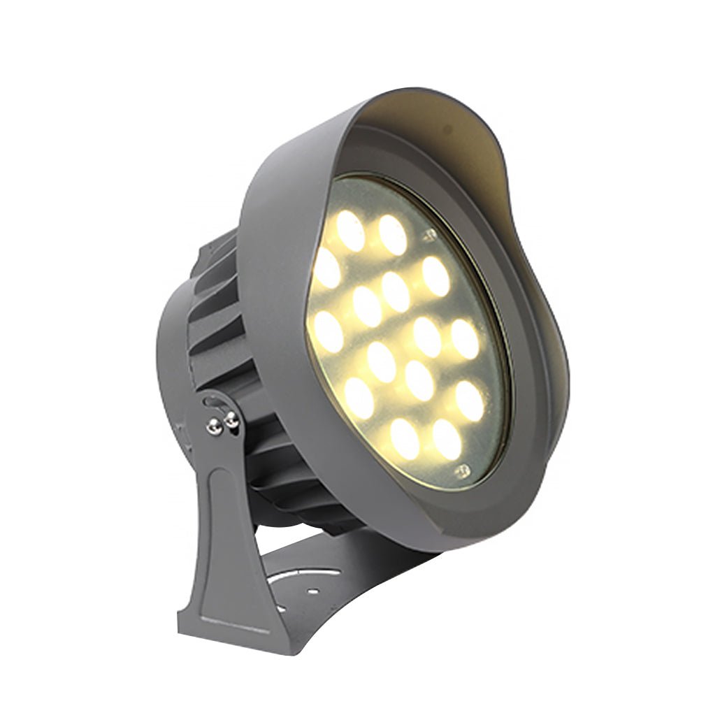 Tree spotlight enhancing a modern outdoor setting with soft light.