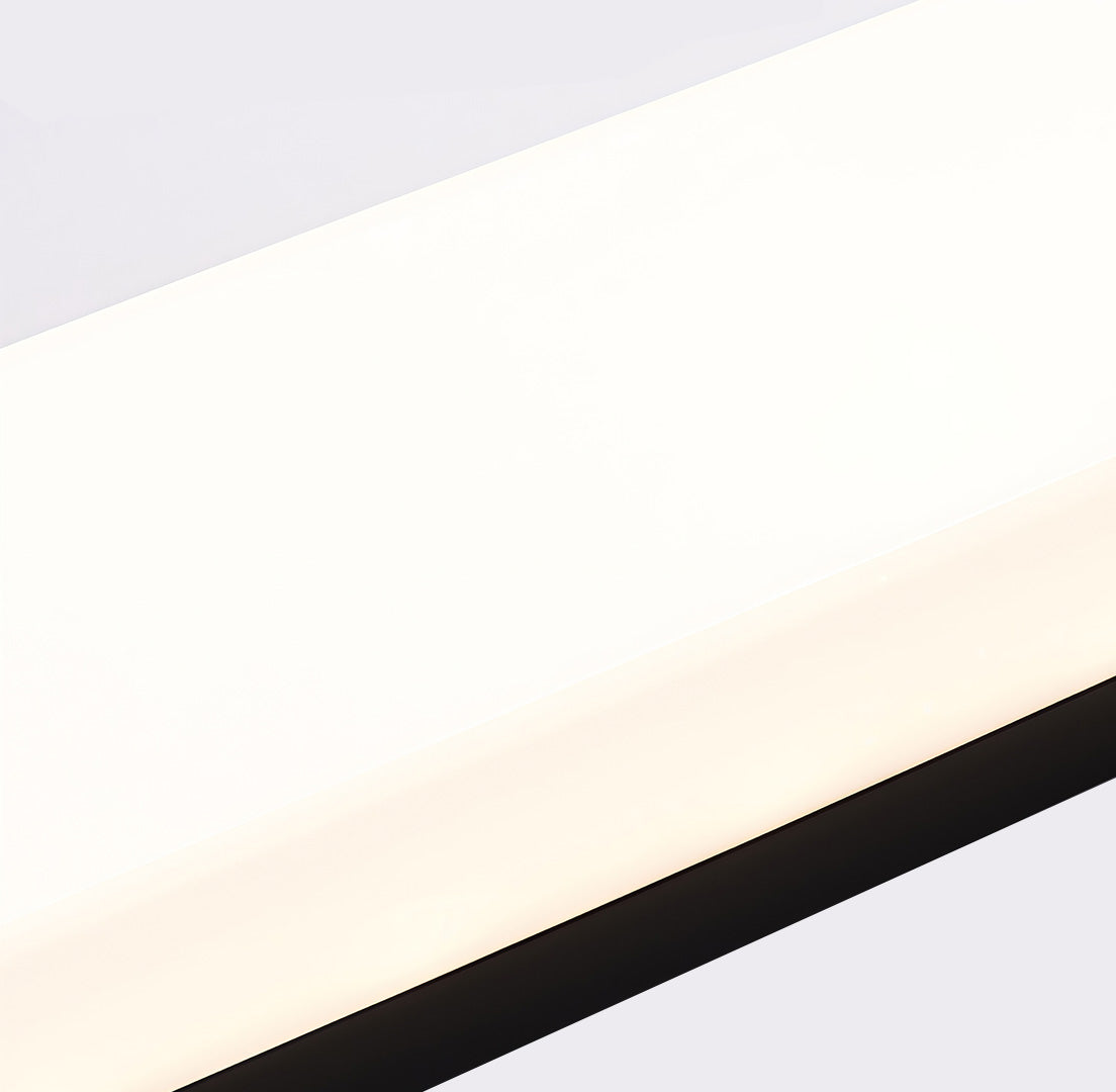 Close-up of vertical wall lighting, showcasing its black and white color scheme and sleek lines.